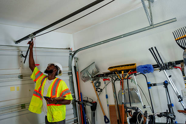 Professional Garage Door Roller Replacement technician working in Falls Church city County, VA
